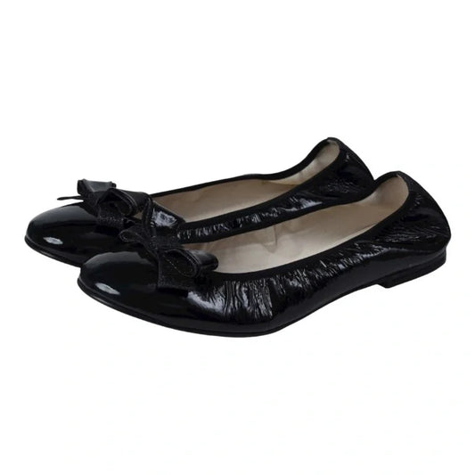 Stylish black patent leather flats for girls by London Kids, perfect for dressy occasions.