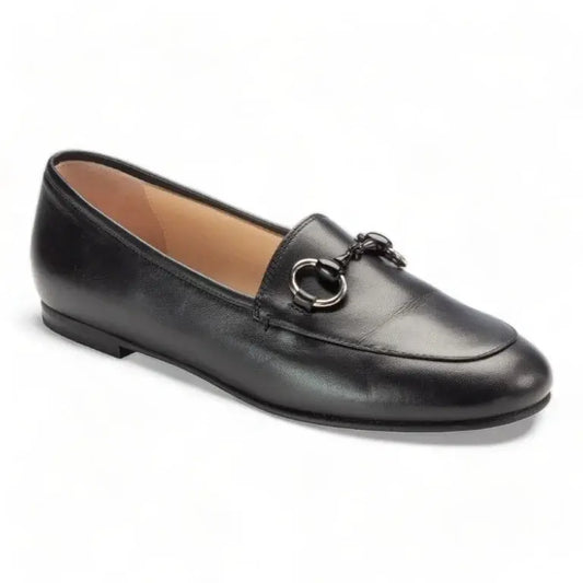 Black soft leather flat loafer for girl or boy by London Kids, ideal for casual or dress occasions.