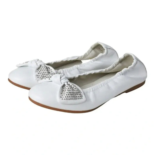 White soft leather flats for girl by London Kids - ballet flats with bow, perfect for dressy occasions.