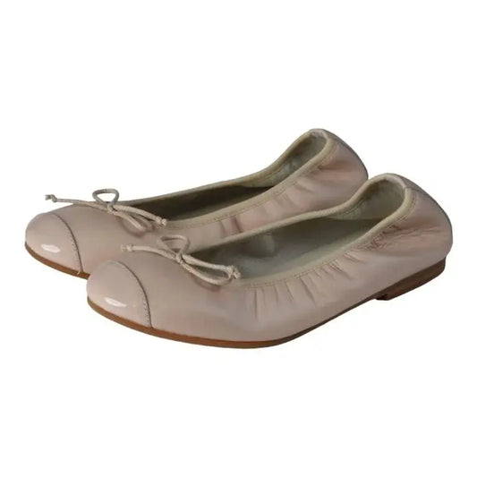 Pink soft leather flats for girls by London Kids - Pink soft leather flats, bow ballet design, ideal for dress occasions.