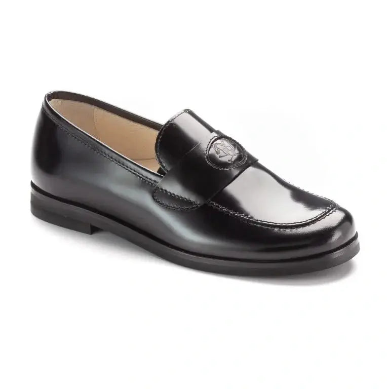 Black polished leather hard loafer for girl or boy by London Kids, a stylish and durable footwear option.