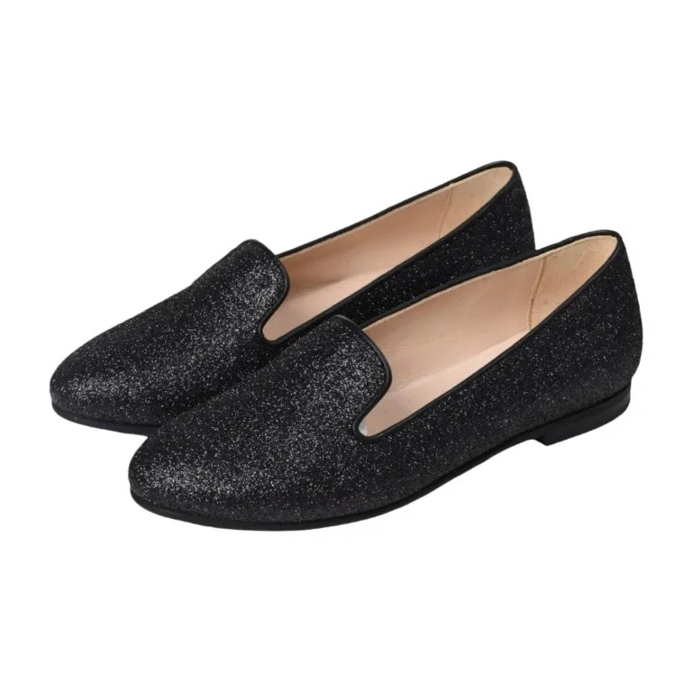 Black glitter smoking loafer for girl by London Kids - stylish and elegant choice for special occasions.