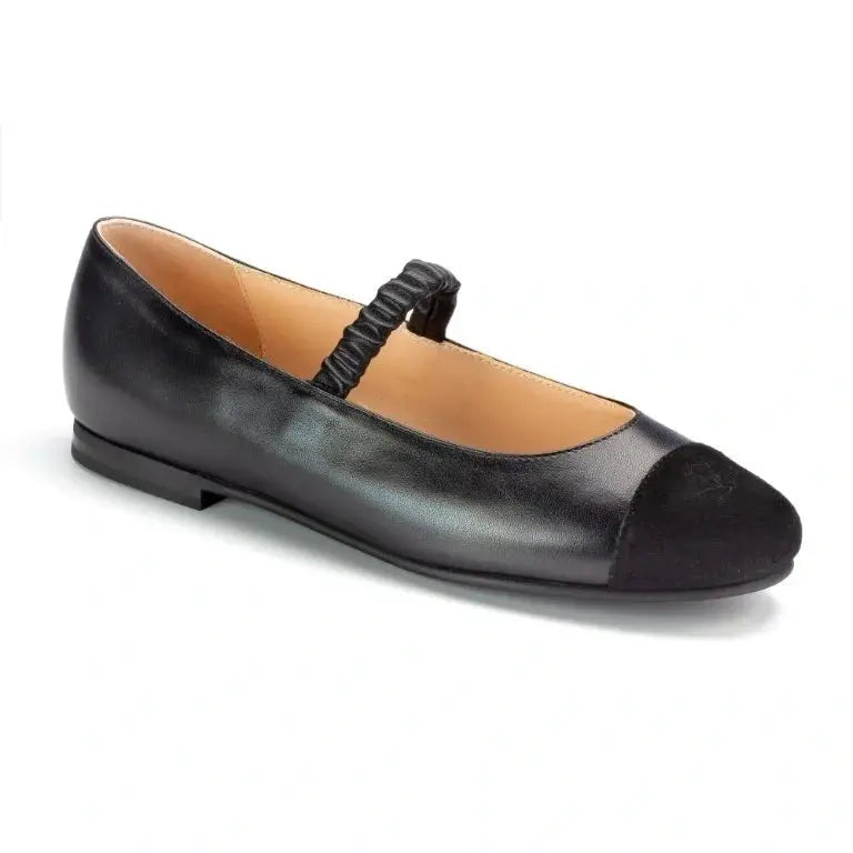 Girl wearing Black Soft Leather Slip On shoes by London Kids