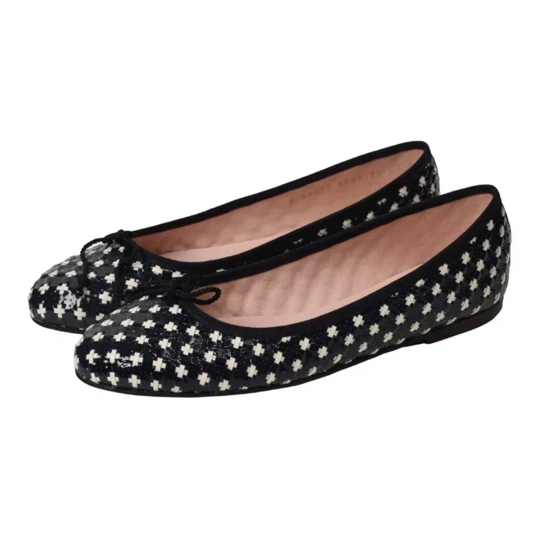 Navy patent leather flats with woven bow detail by Pretty Ballerinas