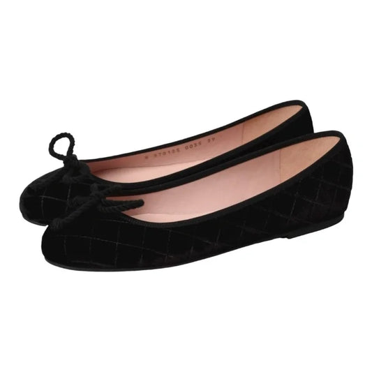 Black velvet flats for teens and women by Pretty Ballerinas - elegant ballet flats with bow detail.