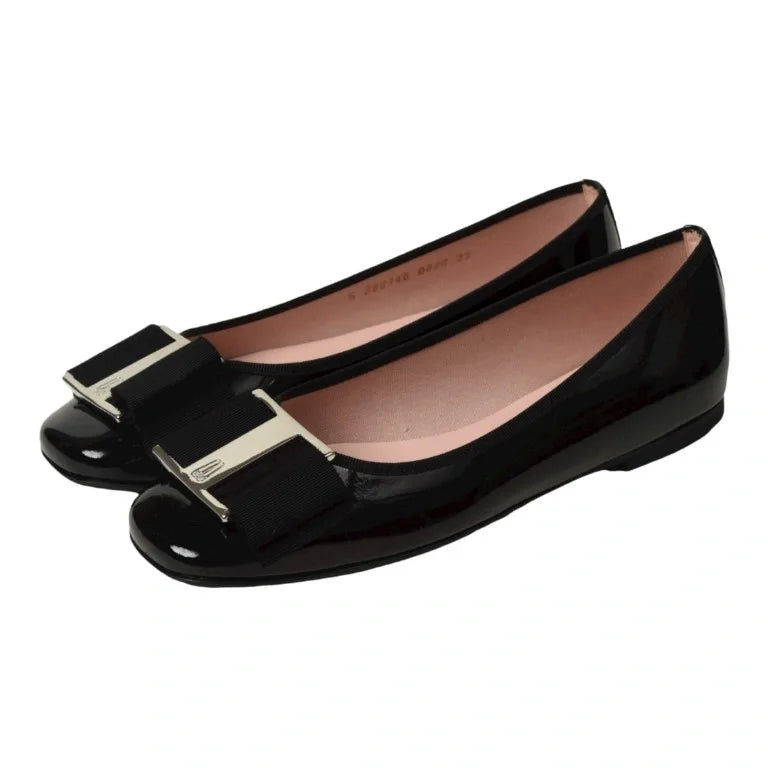 Stylish black patent leather flats for teens and women by Pretty Ballerinas, perfect for dressy occasions