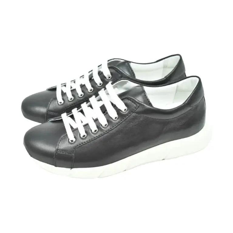 Black soft leather sneaker for girl by London Kids, ideal for casual wear