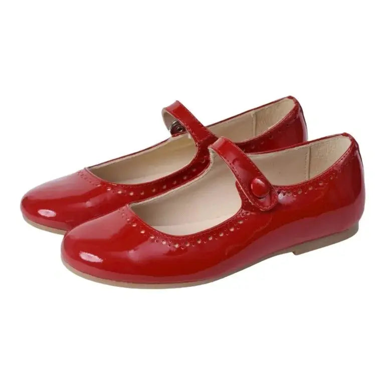 Stylish red patent leather strap for girls by Manuela de Juan, perfect for dressy occasions.