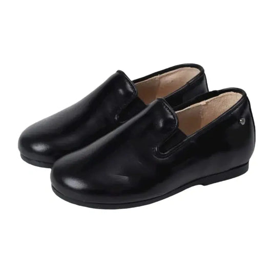 Black soft leather slip-on shoes for boy/girl by Manuela de Juan