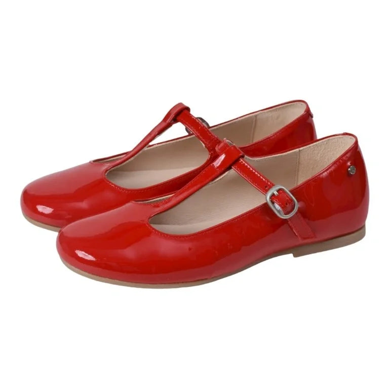 Red patent leather strap shoes for girls by Manuela de Juan - Charlotte, dressy T-strap shoe in vibrant red color.