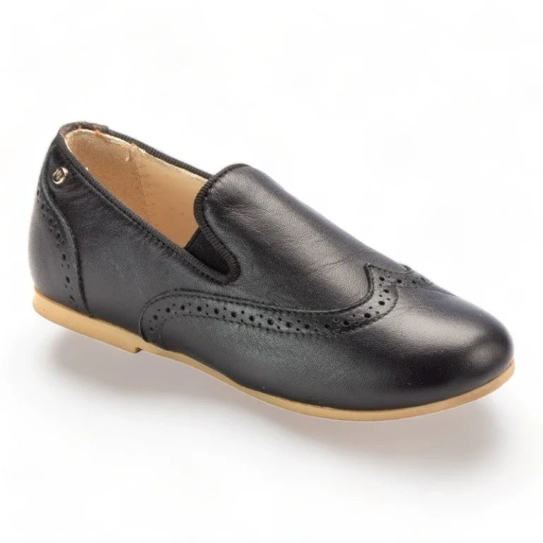 Black soft leather slip-on shoes for boys by Manuela de Juan