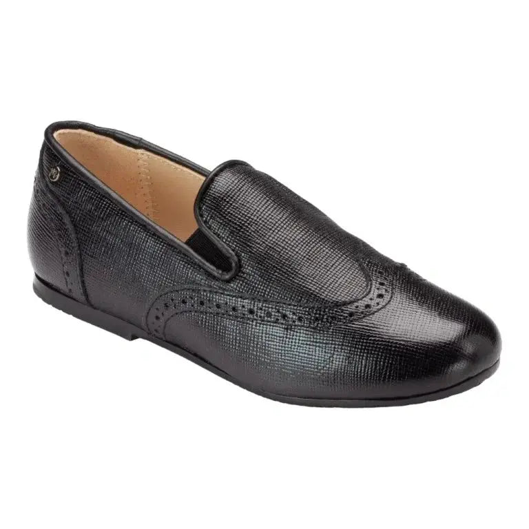 Stylish black patent leather slip-on shoes for boys by Manuela de Juan