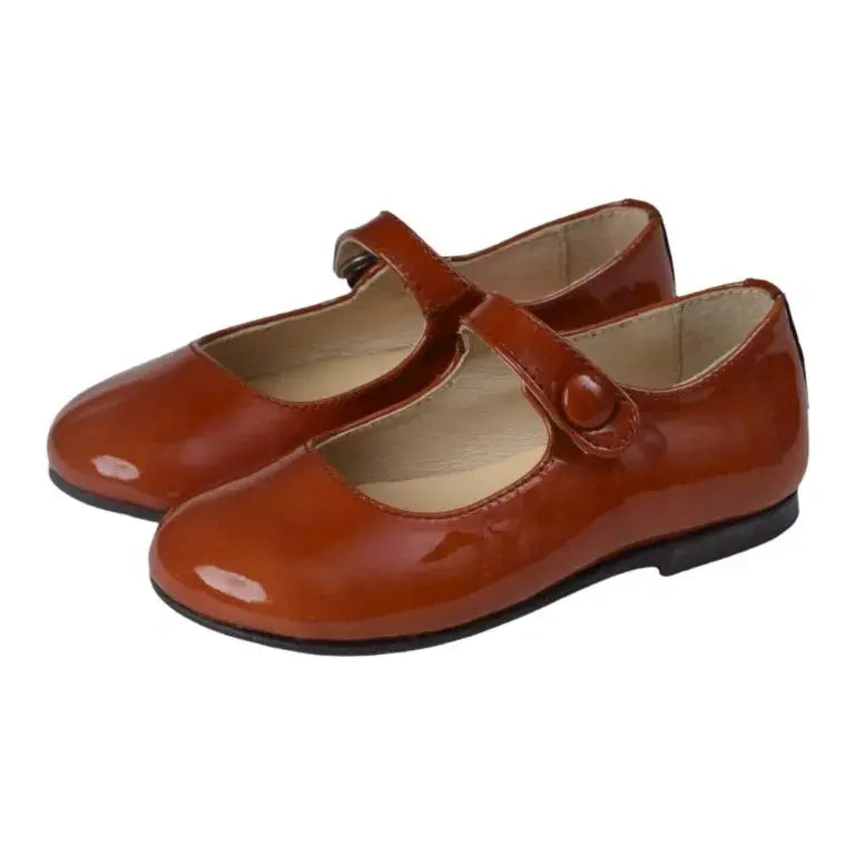 Girl wearing Tan Patent Leather Strap Mary Janes by Manuela de Juan in tan color