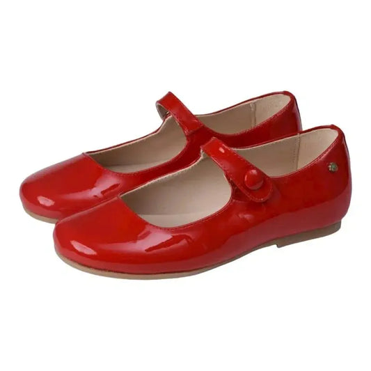 Red patent leather strap for girl by Manuela de Juan - snap-closure Mary Jane in vibrant red.